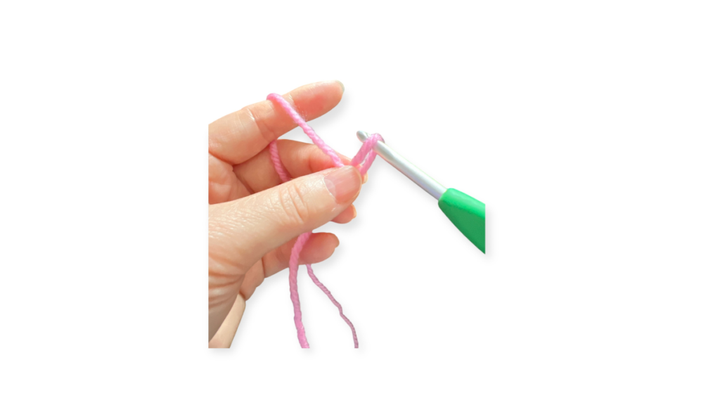 ループの交差部分を指で持っている画像